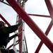 An emergency rescue technician climbs a crane ladder to simulate a rescue mission on Sunday. Daniel Brenner I AnnArbor.com